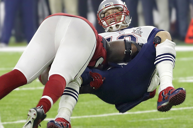 Atlanta Falcons' Grady Jarrett sacks New England Patriots' Tom Brady. (AP/David J. Phillip)