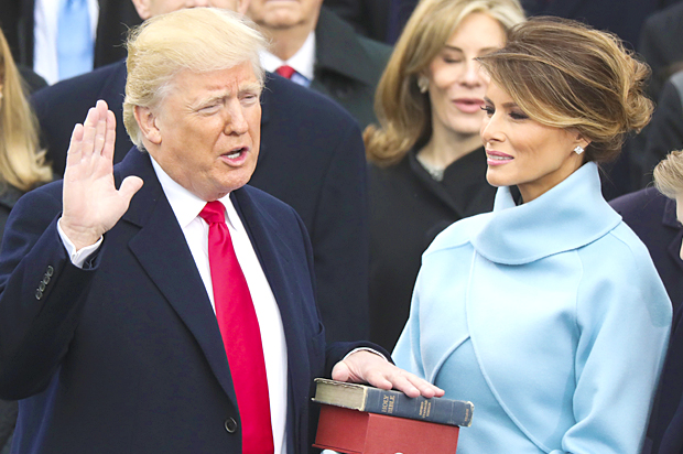 Donald Trump is sworn in as the 45th president of the United States as Melania Trump (AP/Andrew Harnik)