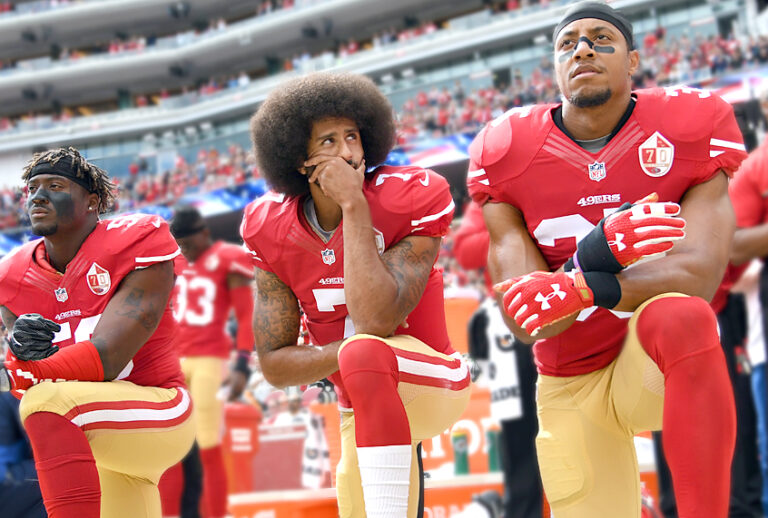 Eli Harold, Colin Kaepernick and Eric Reid of the San Francisco 49ers (Getty/Thearon W. Henderson)