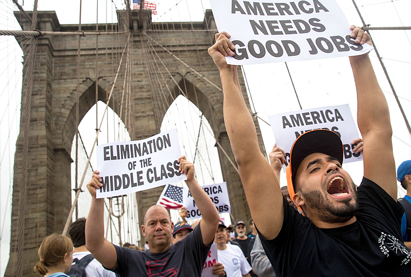 Hundreds of union members march in support of IBEW Local 3 (Getty/Drew Angerer)