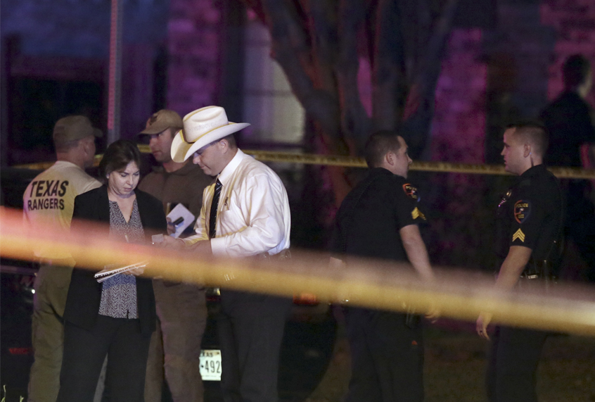 Law enforcement officers and investigators outside the scene of a shooting in Plano, Texas, Sept. 10, 2017. (AP/LM Otero)