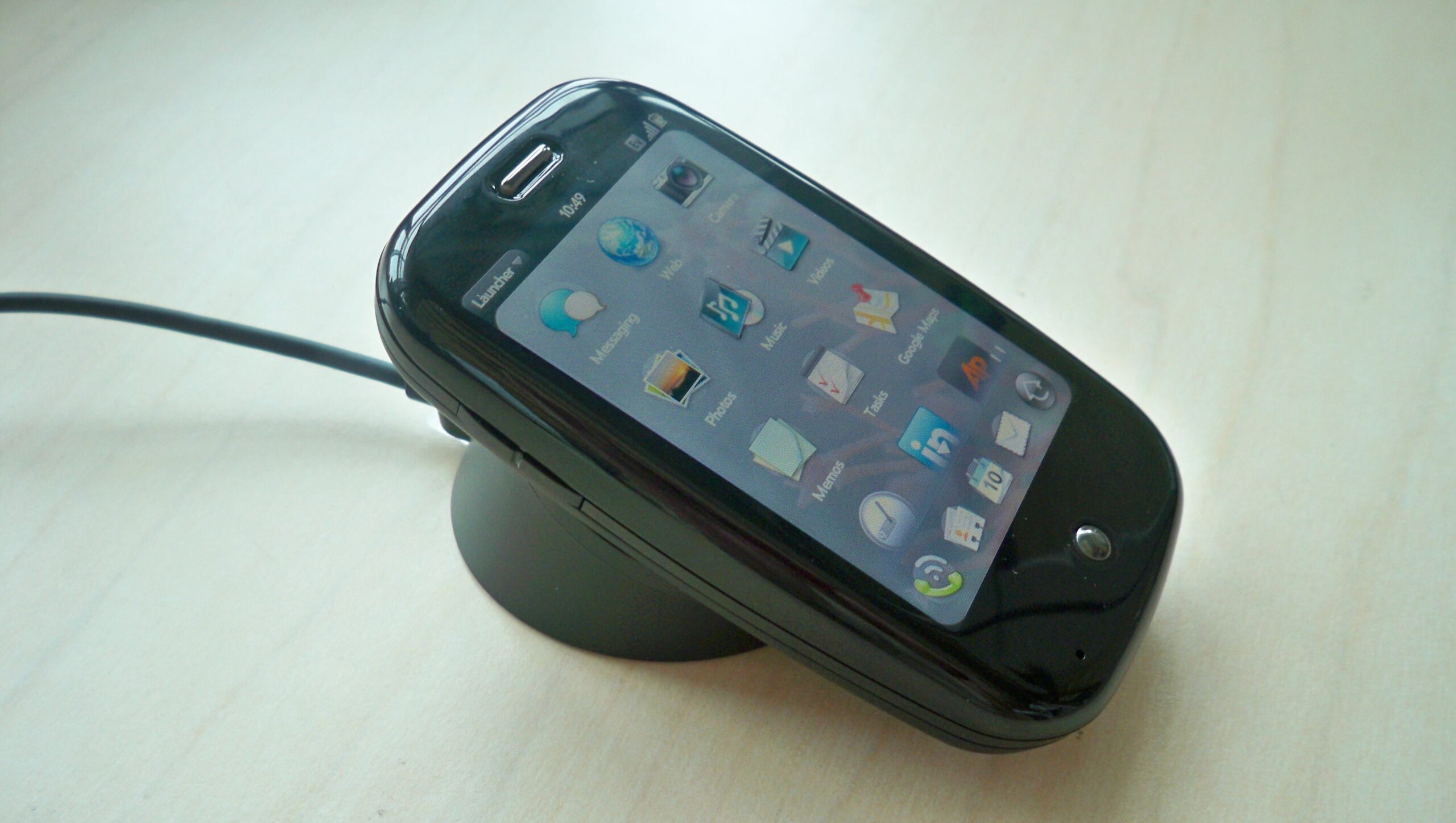 Palm Inc.'s Pre smartphone from 2009 sitting on a wireless charger. (Patrick Moorehead)