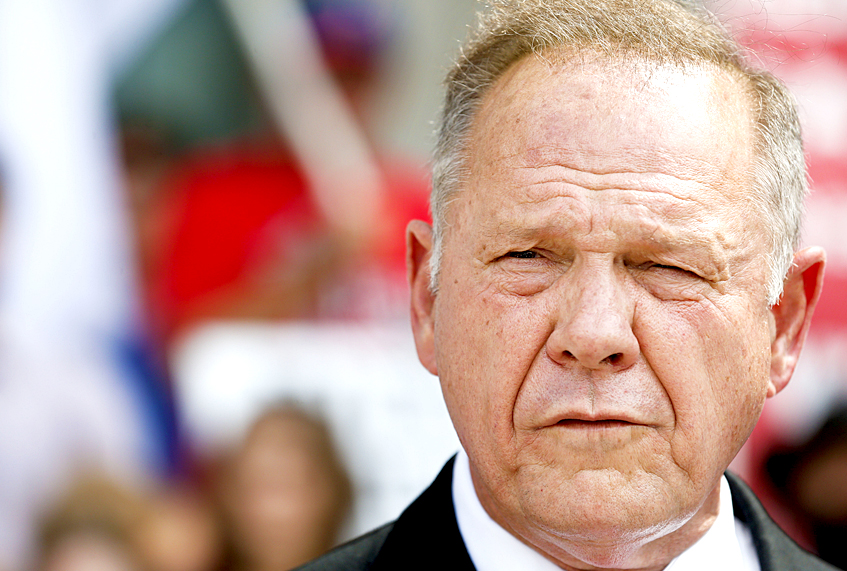 Alabama Chief Justice Roy Moore speaks to the media during a news conference in Montgomery, Ala., on Monday, Aug. 8, 2016. He is accused of breaking judicial ethics during the fight over same-sex marriage in the state. (AP Photo/Brynn Anderson) (AP)