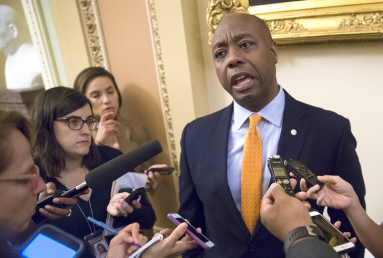 Tim Scott talks about his plan to meet with Donald Trump to discuss race. (AP/J. Scott Applewhite)