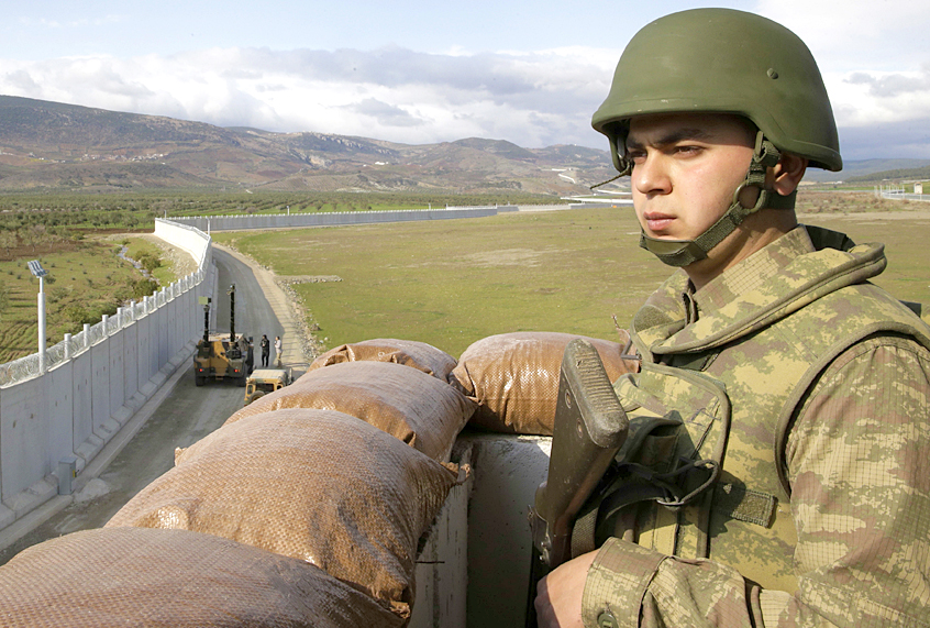 Turkish army soldier mans an outpost (AP/Lefteris Pitarakis)