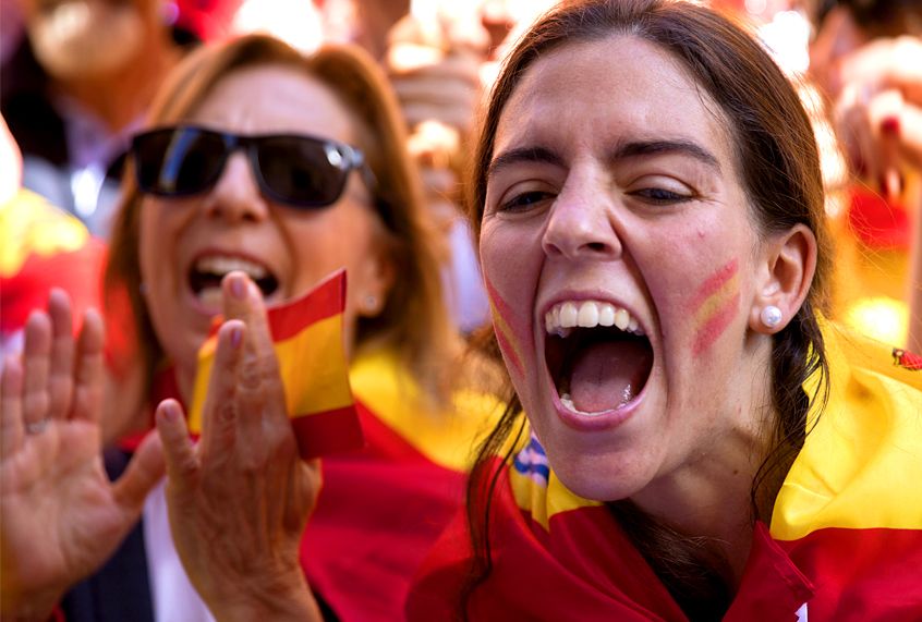 Demonstrators shout as thousands protest the Catalan government's push for secession from the rest of Spain (AP/Emilio Morenatti)