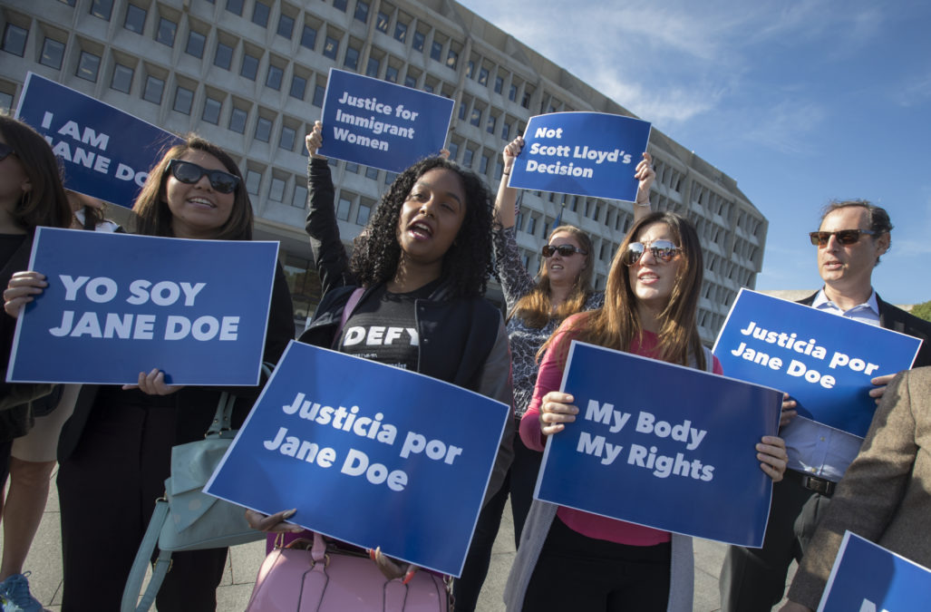 Activists with Planned Parenthood demonstrate in support of a pregnant 17-year-old being held in a Texas facility for unaccompanied immigrant children to obtain an abortion, outside of the Department of Health and Human Services in Washington, Friday, Oct. 20, 2017. (J. Scott Applewhite/AP Photo)