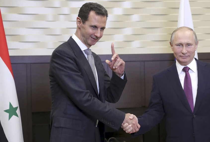 Bashar Assad and Vladimir Putin (AP/Mikhail Klimentyev)