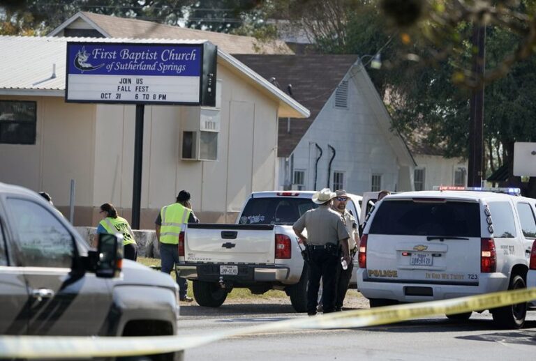 Law enforcement officers gather in front of the First Baptist Church of Sutherland Springs after a fatal shooting, Nov. 5, 2017, in Sutherland Springs, Texas (AP/Darren Abate)