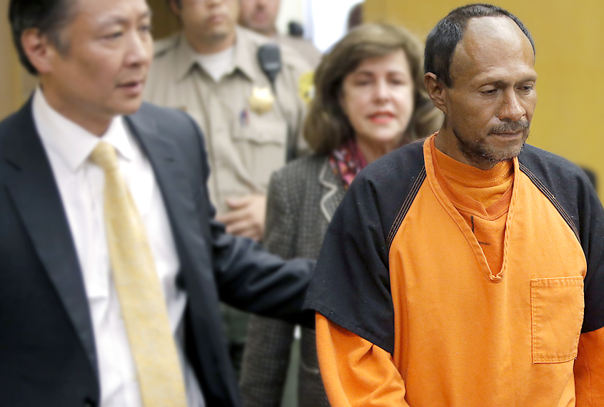 Jose Ines Garcia Zarate, right, is led into the courtroom (AP/Michael Macor)