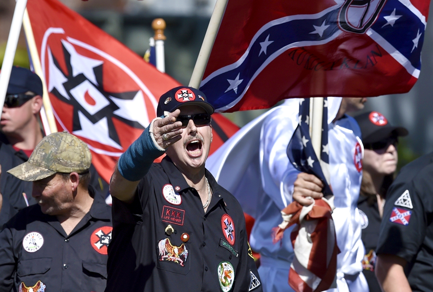 Loyal White Knights Grand Dragon Will Quigg shouts to protestors during a "White Pride" rally (AP/Mike Stewart)