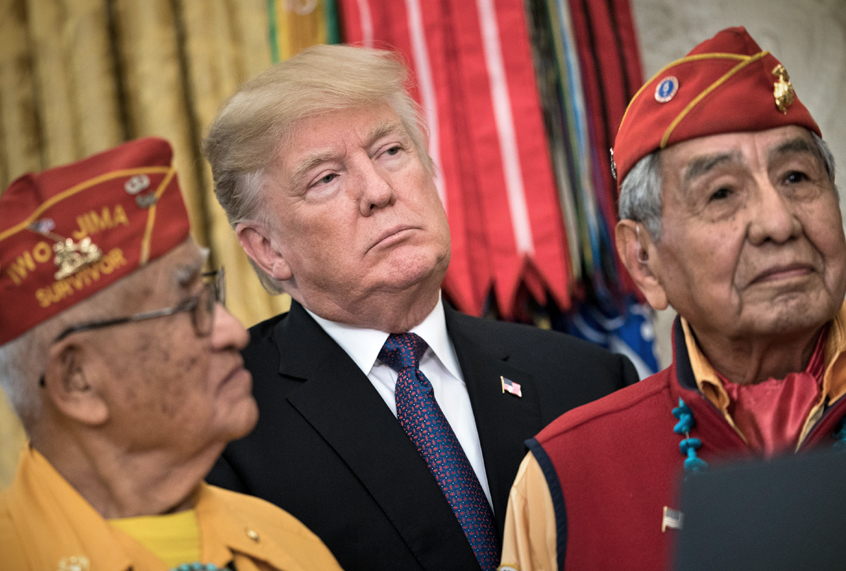 Donald Trump appears with Navajo Code Talkers in the White House during an event to honor Native American code talkers who served in World War II, November 27, 2017. (Getty/Brendan Smialowski)