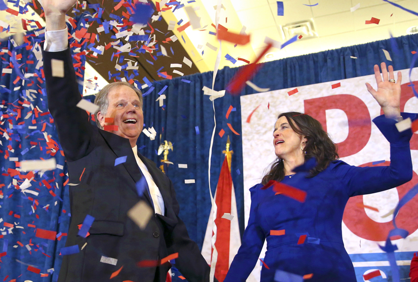 Doug Jones and his wife Louise (AP/John Bazemore)