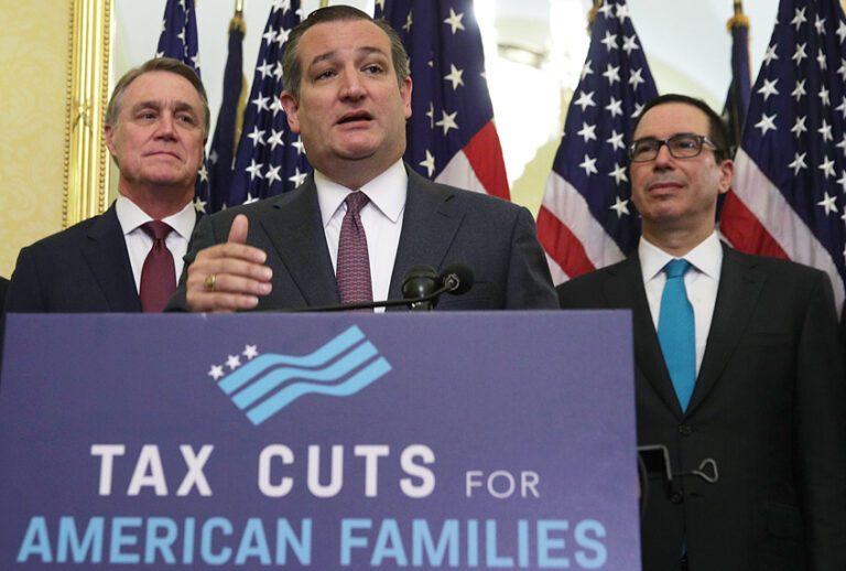 Ted Cruz speaks as  Sen. David Perdue and Secretary of the Treasury Steven Mnuchin listen during a news conference on tax reform (Getty/Alex Wong)
