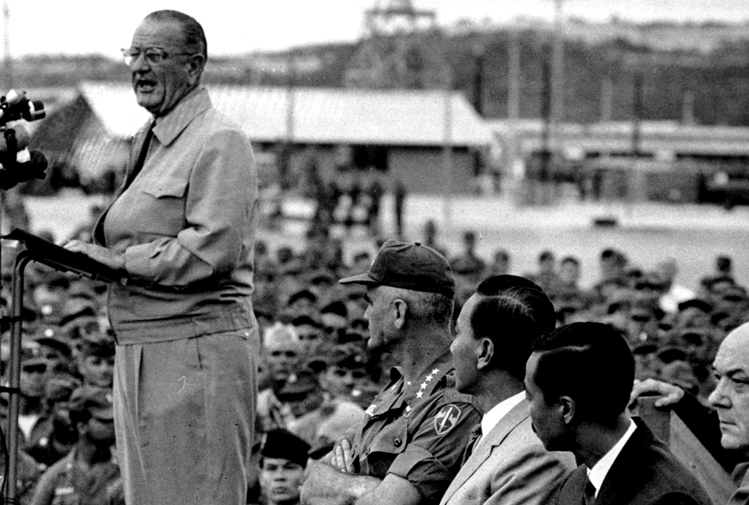 President Johnson stands before american Troops at Cam Ranh Bay while visiting South Vietnam, Oct. 26, 1966. (AP)