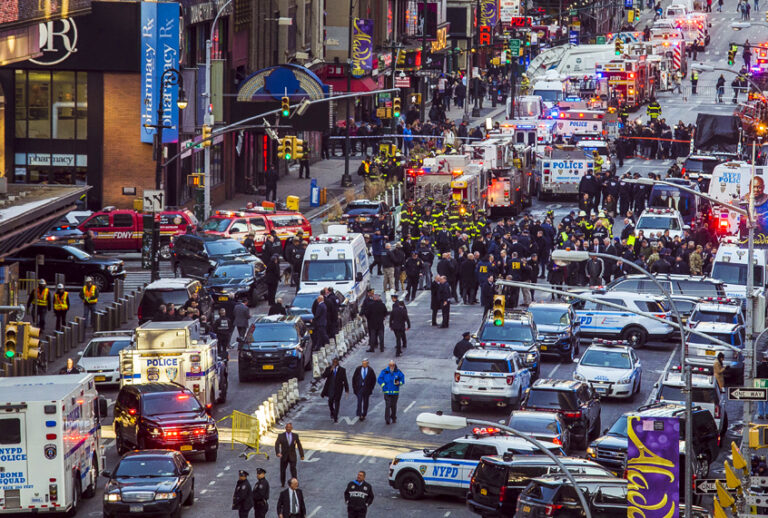Law enforcement officials work following an explosion near New York's Times Square on Monday, Dec. 11, 2017 (AP/Andres Kudacki)