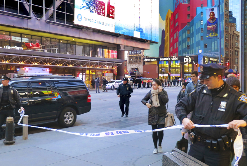Police secure Eighth Avenue outside the Port Authority Bus Terminal following an explosion near New York's Times Square on Monday, Dec. 11, 2017 (AP/Chuck Zoeller)
