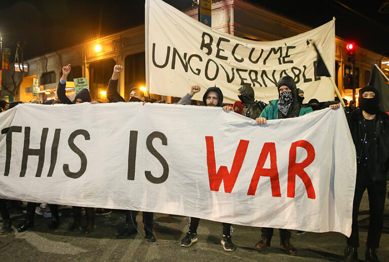 People protesting controversial Breitbart writer Milo Yiannopoulos, February 1, 2017 in Berkeley, California. (Getty/Elijah Nouvelage)