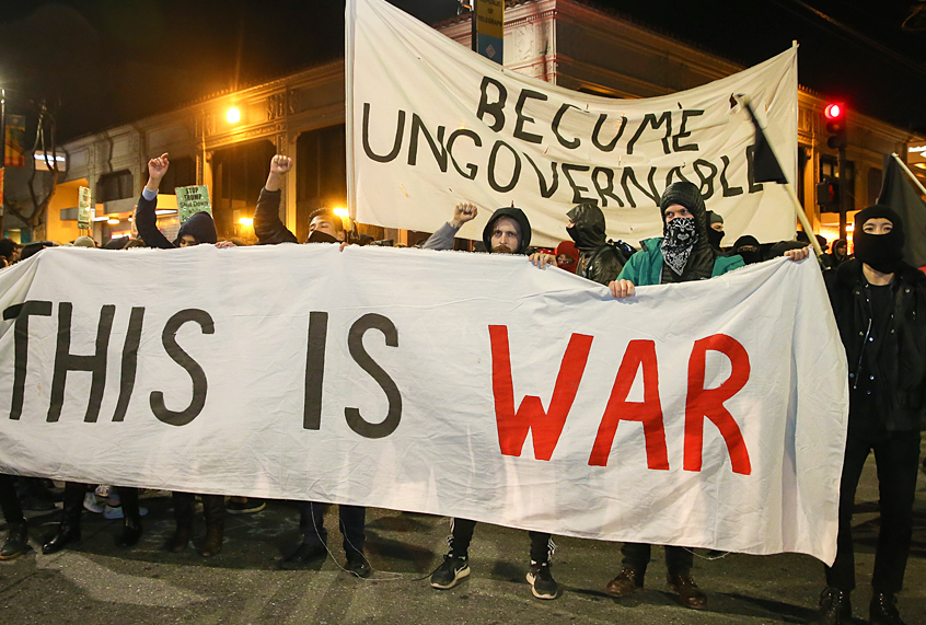 People protesting controversial Breitbart writer Milo Yiannopoulos, February 1, 2017 in Berkeley, California. (Getty/Elijah Nouvelage)