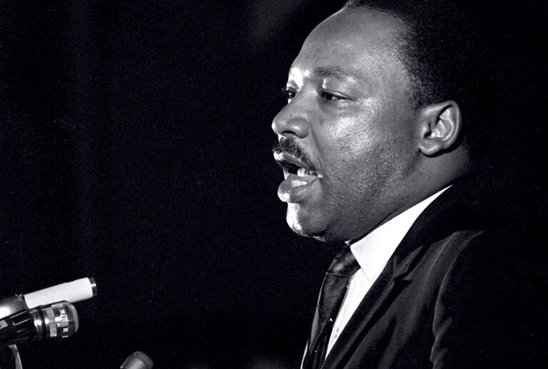 Dr. Martin Luther King Jr. makes his last public appearance at the Mason Temple in Memphis, Tenn., on April 3, 1968. (AP/Charles Kelly)