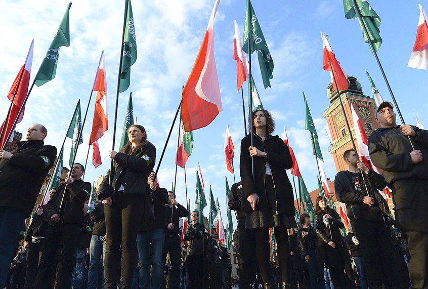Members of the far-right group, the National-Radical Camp, marking the 83rd anniversary of their organization, in Warsaw, Poland. (AP/Czarek Sokolowski)