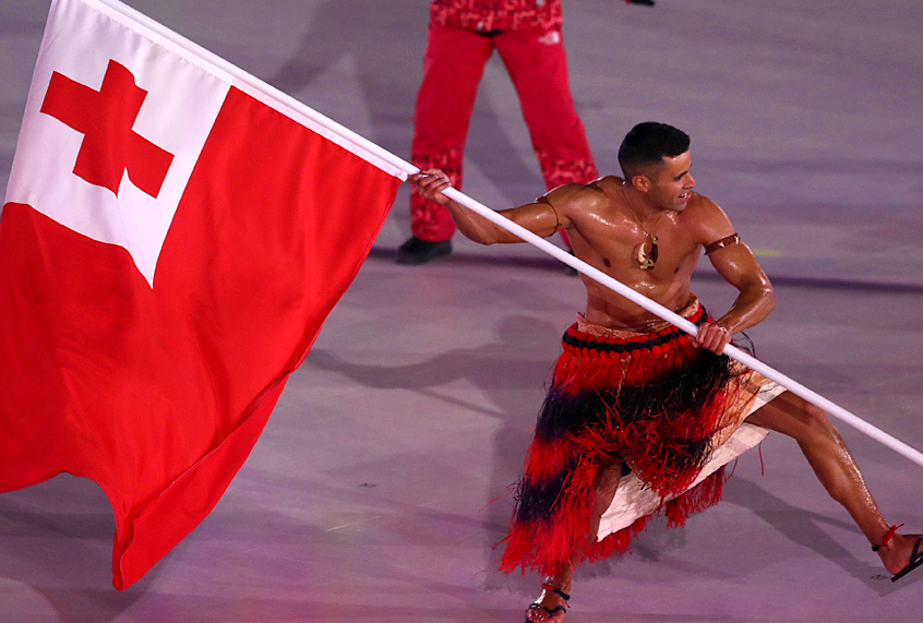 Flag bearer Pita Taufatofua of Tonga leads the team during the Opening Ceremony of the PyeongChang 2018 Winter Olympic Games (Getty/Lars Baron)