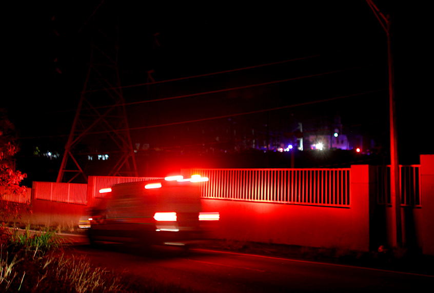 Ambulances are seen at an electric substation after an explosion and fire was reported and caused a black out in parts of San Juan, February 11, 2018. (Getty/Ricardo Arduengo)