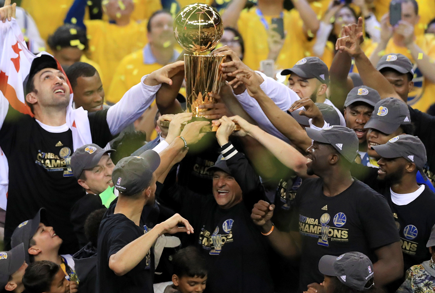 The Golden State Warriors celebrate after winning the 2017 NBA Finals (Getty/Ronald Martinez)