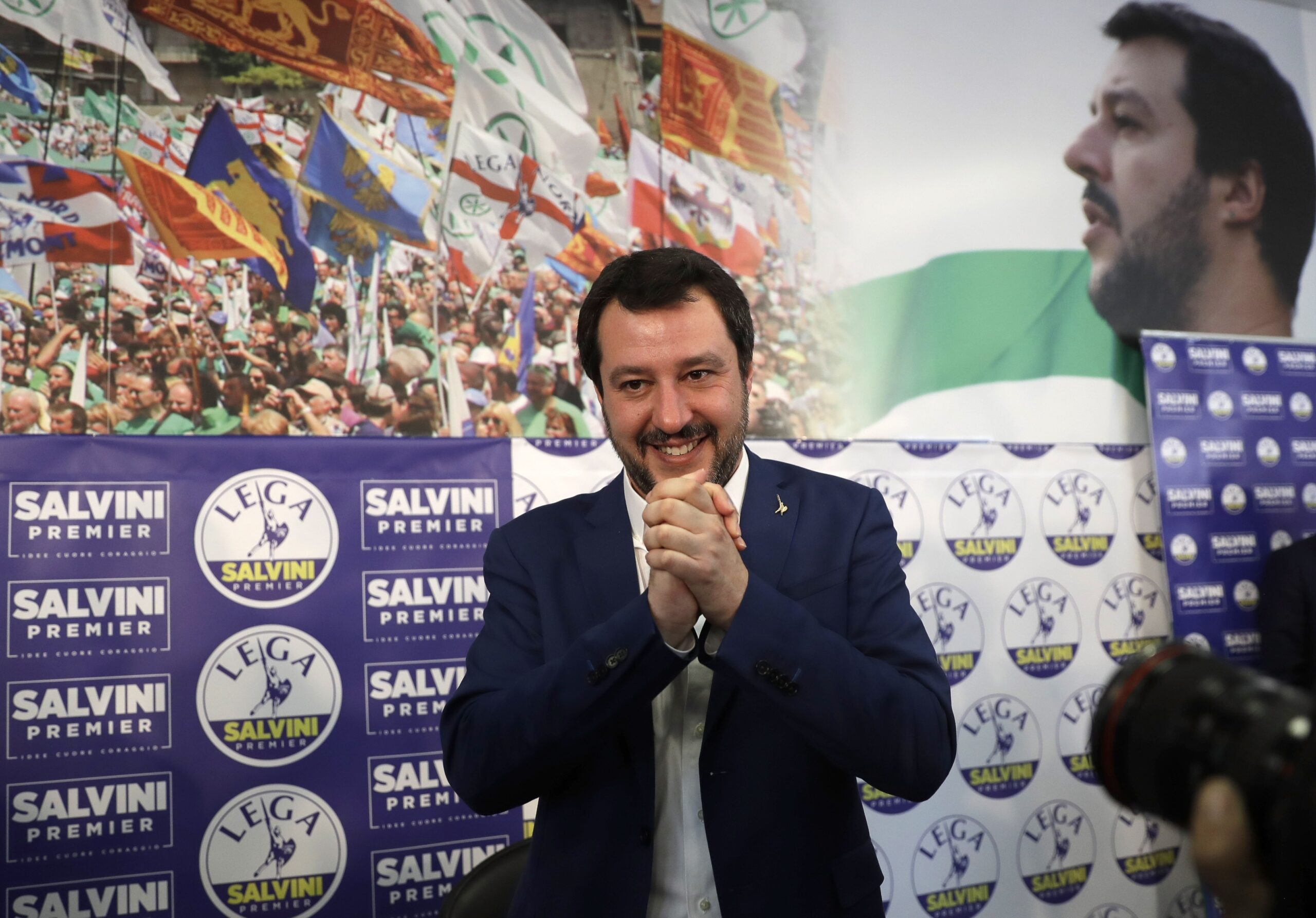 Right-wing, anti-immigrant and euroskeptic League's Matteo Salvini gives a press conference on the preliminary election results, in Milan, Monday, March 5, 2018. (AP Photo/Luca Bruno)