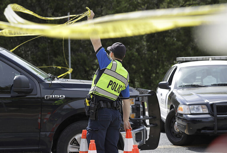 An Austin police officer near the site of an explosion, March 19, 2018, in Austin, Texas. (AP/Eric Gay)