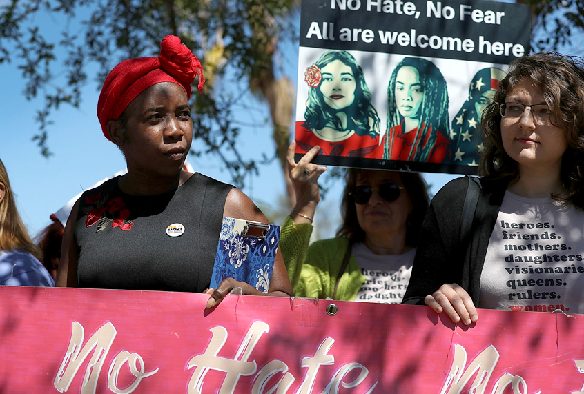 Women protest on International Women's Day in front of the U.S. Department of Homeland Security Immigration and Immigration and Customs Enforcement (ICE) office. (Getty/Joe Raedle)