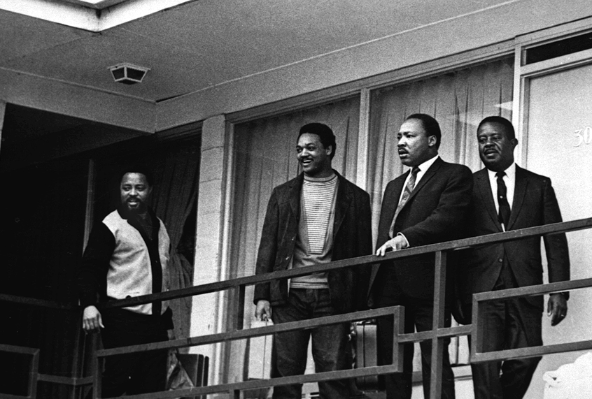 The Rev. Martin Luther King Jr. stands with other civil rights leaders on the balcony of the Lorraine Motel in Memphis, Tenn., on April 3, 1968, a day before he was assassinated. (AP)