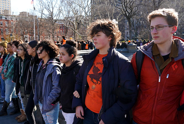 Students from Harvest Collegiate High School form a circle around the fountain in Washington Square Park on March 14, 2018 in New York to take part in a national walkout to protest gun violence. (Getty/Timothy A. Clary)