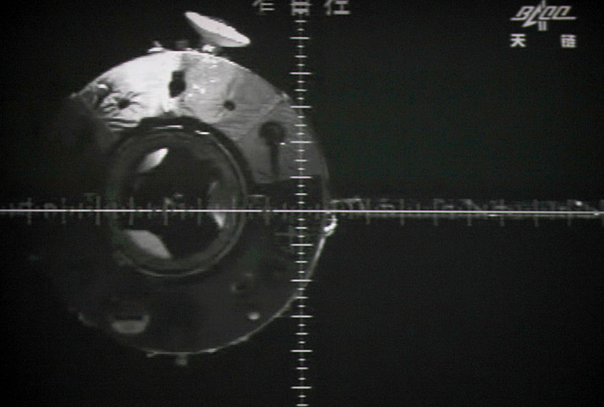 The Tiangong-1 module is seen via a camera in the Shenzhou-9 spacecraft. (STR/Getty)