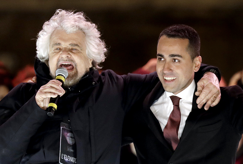 Five-Star Movement (M5S)  party founder Beppe Grillo and candidate premier, Luigi Di Maio attend their party's final rally in Rome, March 2, 2018. (AP/Andrew Medichini)