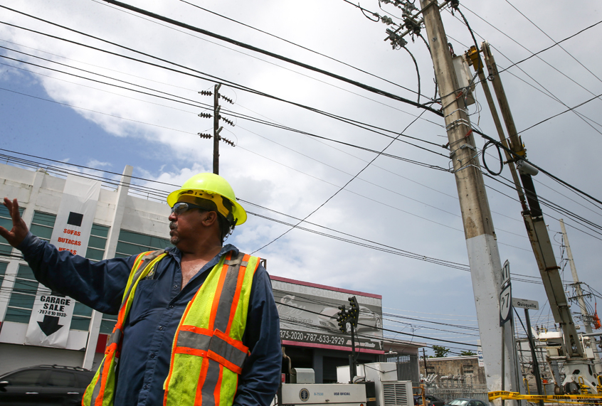 Repair work is done on power lines affected by Hurricane Maria April 18, 2018 in San Juan, Puerto Rico. (Getty Images)