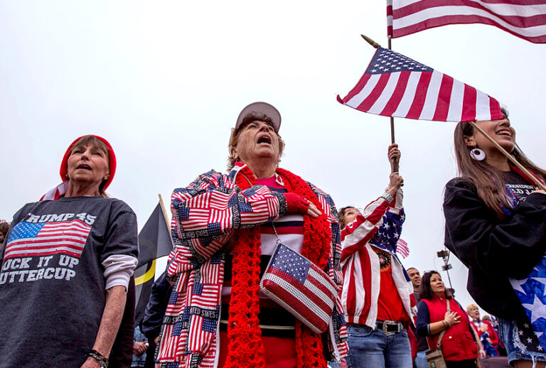 Trump supporters sing the National Anthem. (Getty/David McNew)