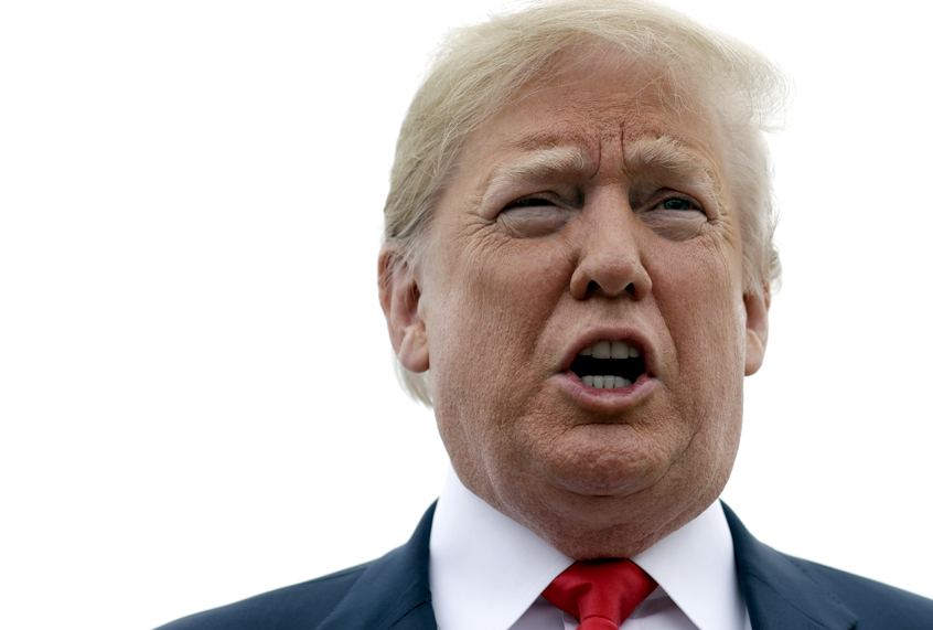 Donald Trump speaks to the media before boarding Air Force One for a trip to Texas to meet with families of the Santa Fe school shooting victims, May 31, 2018. (AP/Evan Vucci)