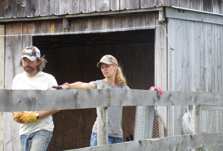 The author and her husband Jason working on their farm in New York. (Bennett Schmitt)