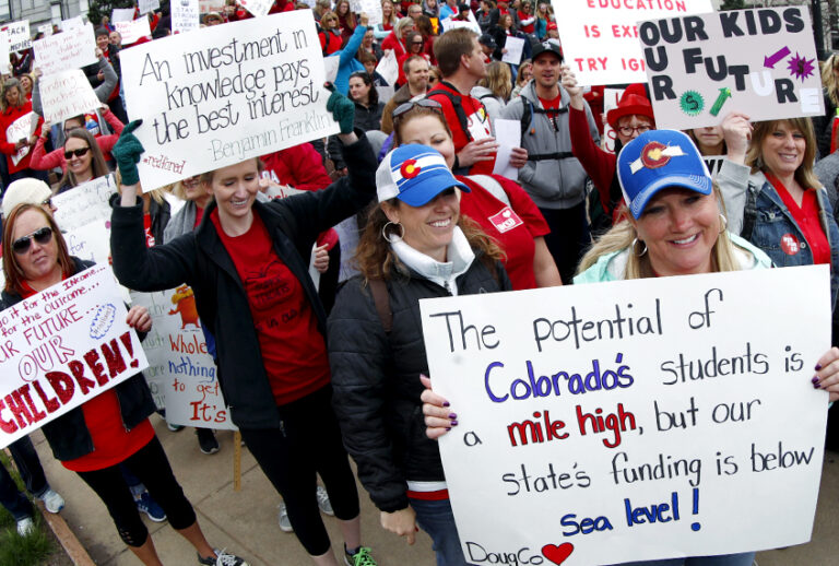 Teachers march around the state Capitol during a teacher rally in Denver. (AP/David Zalubowski)