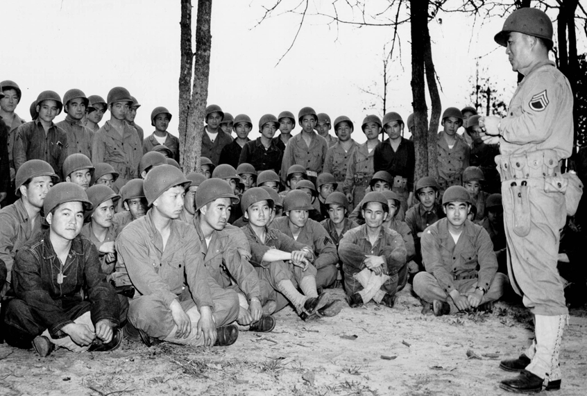The 100th Infantry Battalion receiving grenade training in 1943. (United States Army Center of Military History)
