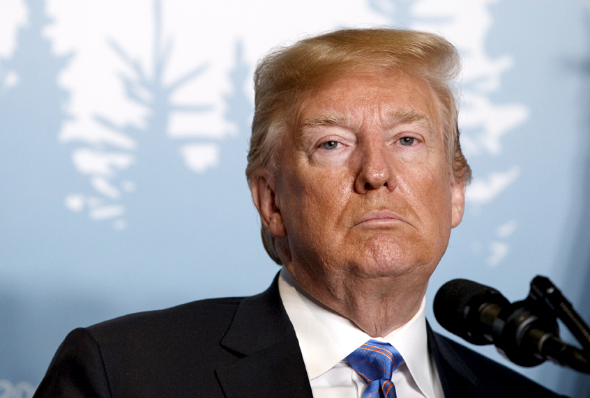 Donald Trump listens to a question during a news conference at the G-7 summit, June 9, 2018 (AP/Evan Vucci)