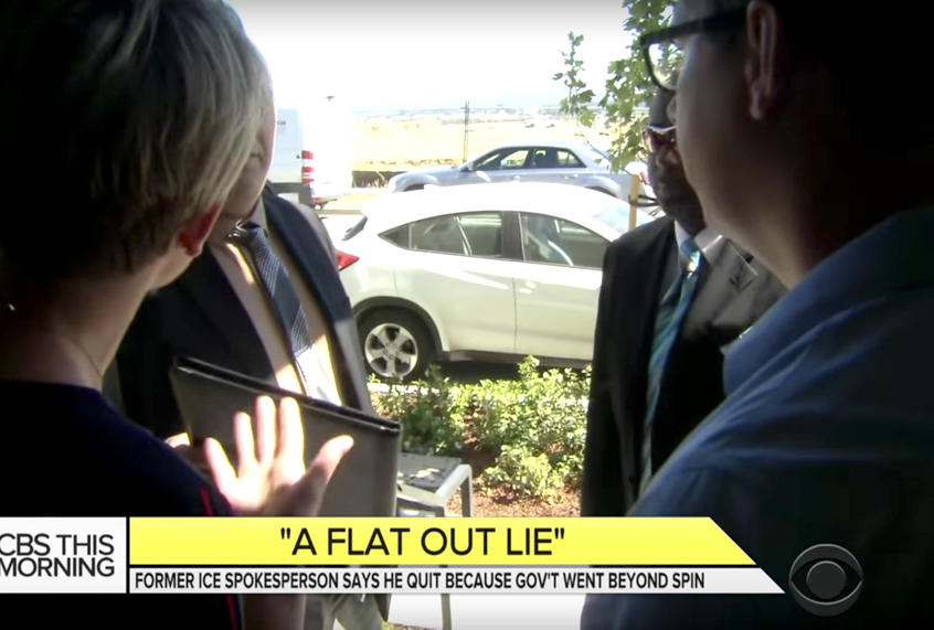 Jamie Yuccas and former ICE spokesman, James Schwab, open the door to Homeland Security agents during an interview. (CBS This Morning)