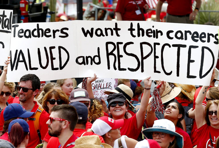 Thousands participate in a protest at the Arizona Capitol for higher teacher pay and school funding. (AP/Ross D. Franklin)