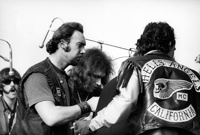 Hells Angels and Jorma Kaukonen, Jefferson Airplane at Altamont 
Dec. 1969 (© Robert Altman 2009)