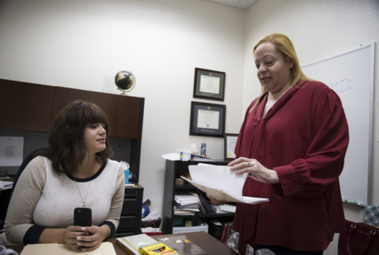 Attorney Laura Barrera, left, and legal secretary Martha Arellano share information at the Thomas & Mack Legal Clinic in Las Vegas, Monday, July 2, 2018. Erik Verduzco Las Vegas Review-Journal @Erik_Verduzco (Erik Verduzco/Las Vegas Review-Journal)