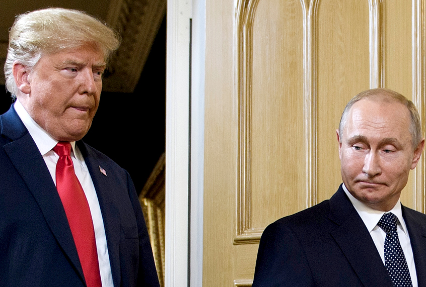 Donald Trump and Vladimir Putin arrive for a meeting in Helsinki, on July 16, 2018. (Getty/Brendan Smialowski)