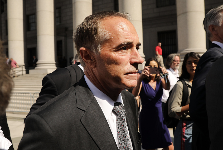 Chris Collins walks out of a New York court house after being charged with insider trading on August 8, 2018 in New York City. (Getty/Spencer Platt)