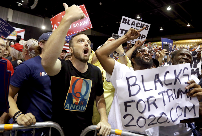Supporters of Donald Trump shout down the CNN news crew before a rally Tuesday, July 31, 2018, in Tampa, Fla. (AP/Chris O'Meara)