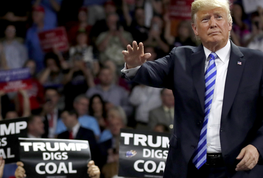 Donald Trump waves after speaking during a rally Aug. 21, 2018, in Charleston, W.Va. (AP/Alex Brandon)